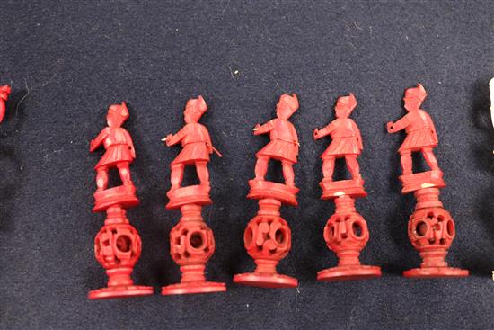 A Canton red-stained and natural ivory chess set (one white knight and one bishop deficient)